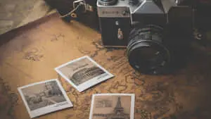 a camera and a map with photos on it