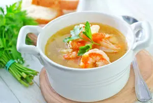 Bowl Of Tom Yum Soup With Parsley