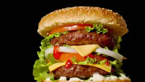 Cheeseburger On A Black Background