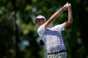 Chesson Hadley Gripping Golf Club Tightly