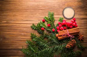 Pine Tree Leaves On Table Christmas Photo Background