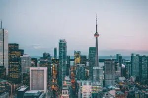  Caption: Majestic View of CN Tower Dominating the Toronto Skyline