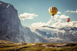 Enjoy the beautiful landscape of the world from a hot air balloon. 
