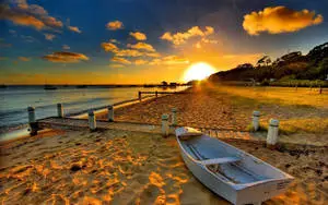 Enchanting Golden Sunset Skyline Over the Calm Ocean