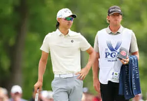 Golferand Caddie Walkingon Course