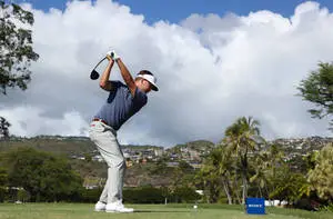 Keith Mitchell About To Hit A Ball