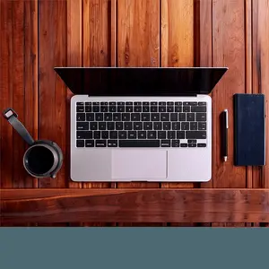 Laptop on Wooden Desk Mockup PNG rvw85