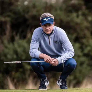 Luke Donald Holding Golf Club