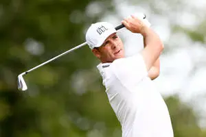 Luke List Swinging Golf Club