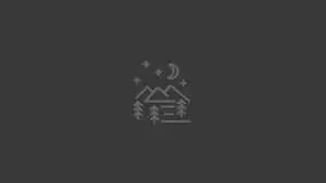 a black and white logo with a mountain and a tree