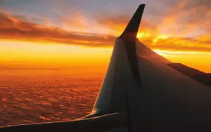 Airplane Wing Sunset Travel Laptop