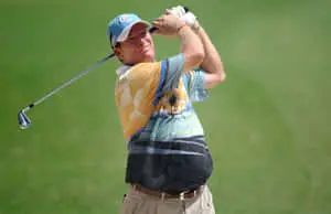 Woody Austin holding a golf club over his shoulder